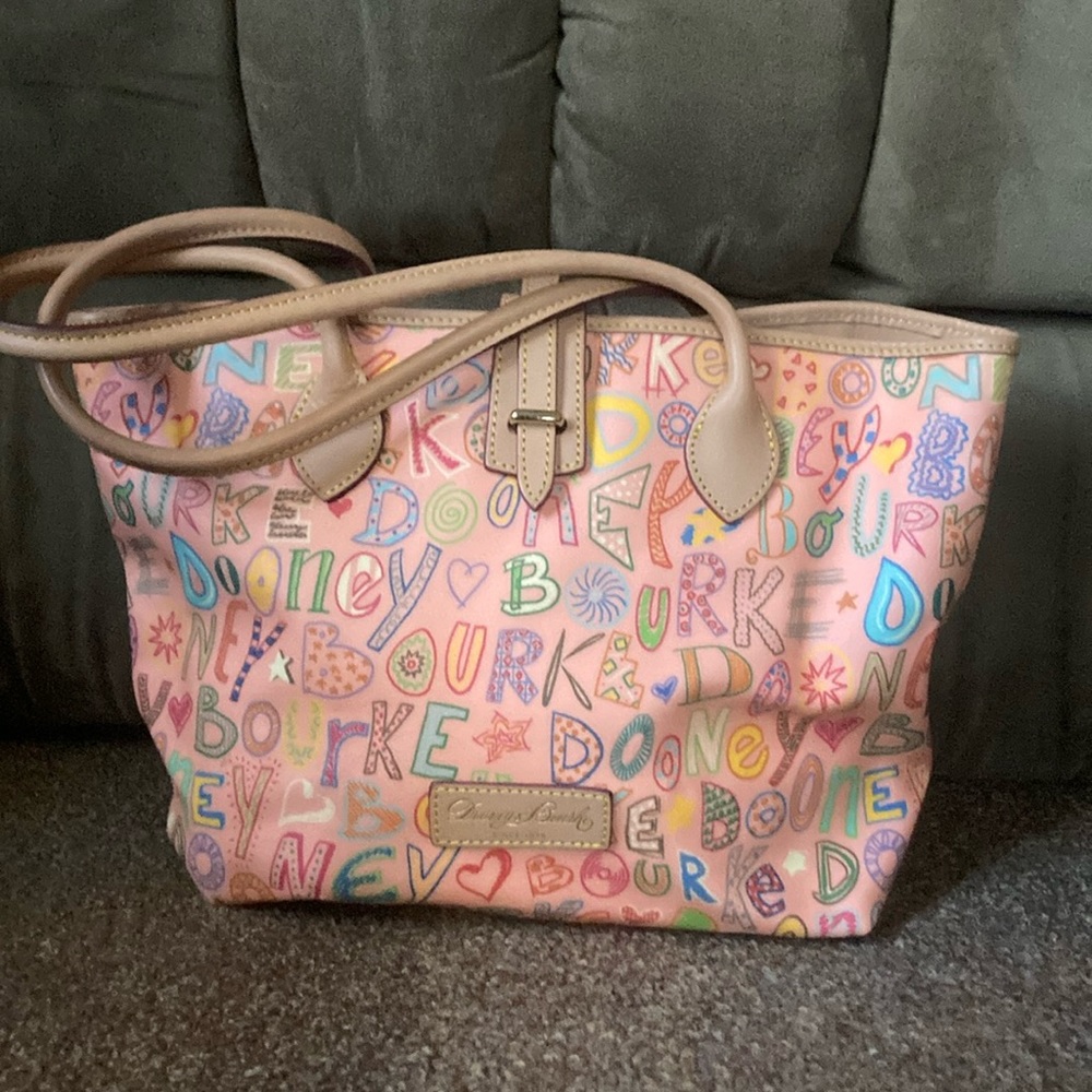 Dooney & Bourke pink leather bag. Pet and smoke free household. Like new.